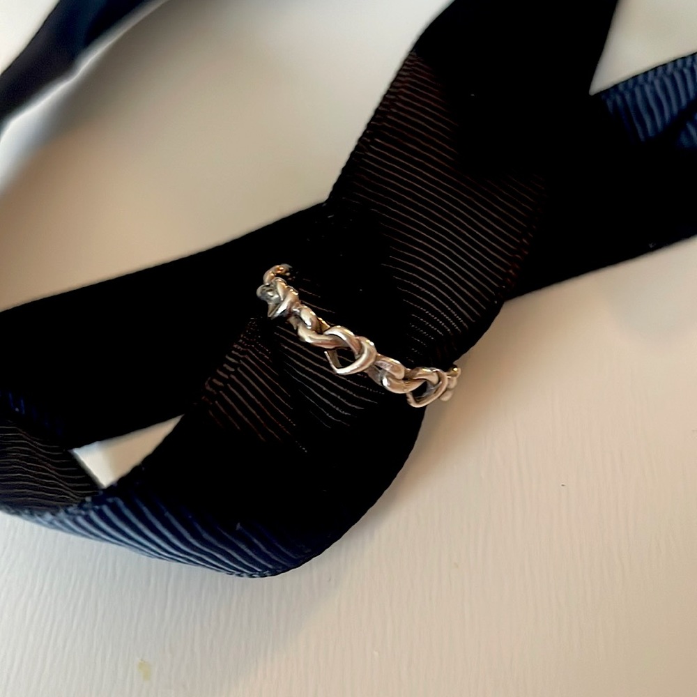 Linked hearts ring